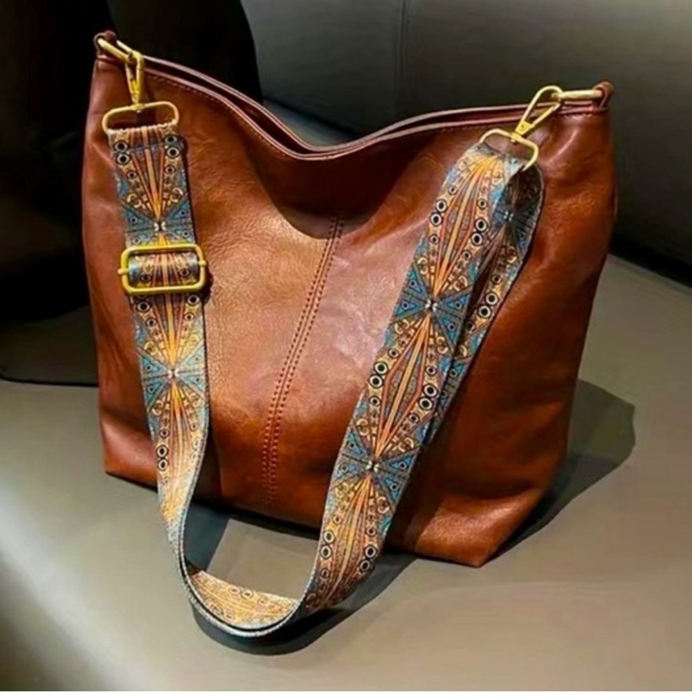 Elegant Brown Leather Shoulder Bag with Patterned Strap
